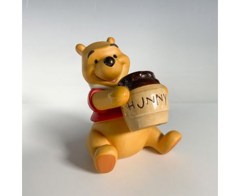 This special edition porcelain figurine was made to commemorate the 30th anniversary of Winnie the Pooh and the Honey Tree. W