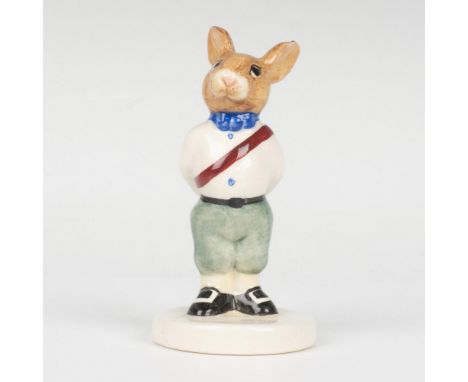 A young royal wearing a white shirt with a dark red sash, and green pants. Part of the Royal Family series. Royal Doulton bac