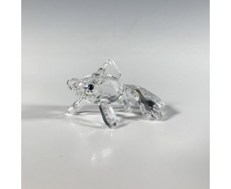 A darling oceanic figure crafted from clear cut crystal, adorned with soft blue eyes. Part of the Aquatic Worlds group. Swaro