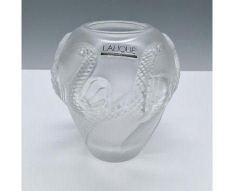 Beautiful frosted crystal vase with a serpent relief pattern. Lalique etched signature on back. This item has its original bo