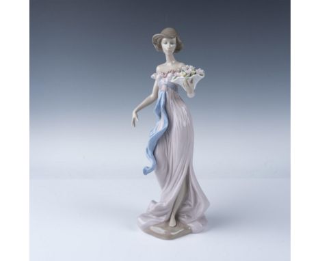 Lladro Spring Flirtation figurine, model number 06365, portrays an elegant woman gracefully holding a basket of delicate flow