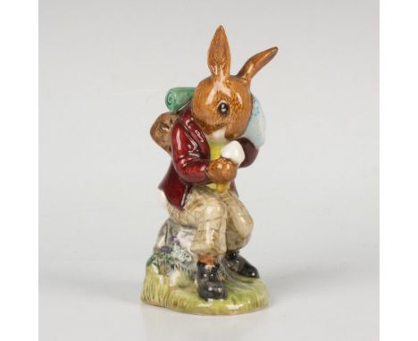 A figure of a bunny, taking a break from the heat by wiping off sweat and enjoying an ice cream. This item comes with its ori