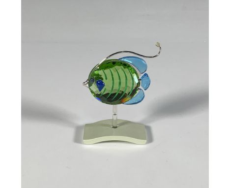 Part of the Exotic Fish and South Sea collection, this delightful sea creature is crafted from blue and green crystal, enhanc