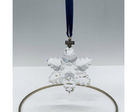 Limited edition crystal ornament that has 6 leaf shaped points and a metal tag with 1996 etched on it. Swarovski backstamp. 1