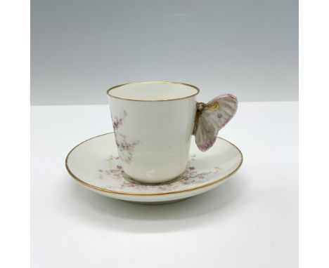 Haviland &amp; Co. Limoges porcelain teacup and saucer featuring a delicate butterfly motif, accented with hand painted detai