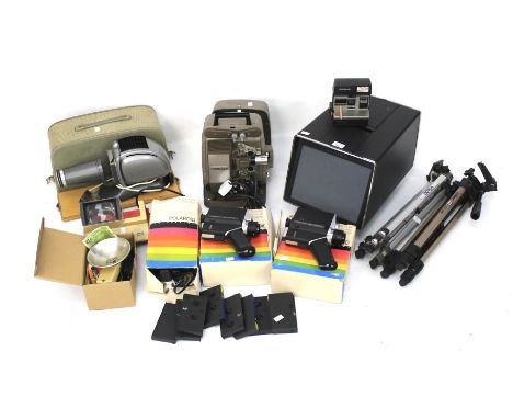 A quantity of assorted vintage photography items including Polaroid cameras, tripods, slide projector and cine cameras, etc.