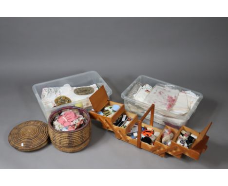 A cantilever sewing box; a wicker sewing box, each with contents; &amp; various items of household linen &amp; textiles.