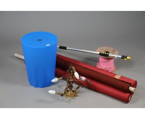 An Authentic’s (Italian) blue plastic laundry receptacle (purchased from The Conran Shop), 48cm high; together with a gilt-me