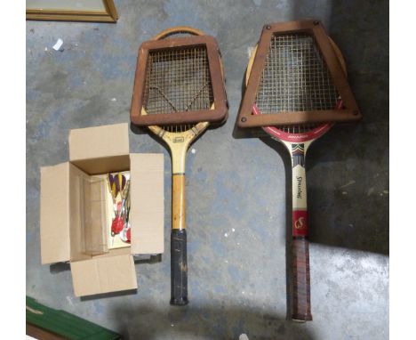 Vintage wooden-framed Spalding tennis racket and stretcher,&nbsp;a vintage wooden-framed Dunlop tennis racket and three sets 