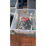 Contents of a crate of braces, suspenders, adult novelty bibs and more