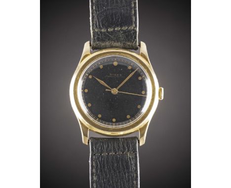 A RARE GENTLEMAN'S 18K SOLID GOLD ROLEX CHRONOMETRE WRIST WATCHCIRCA 1940s, REF. 3081 WITH GLOSS BLACK GILT DIALMovement: 18J