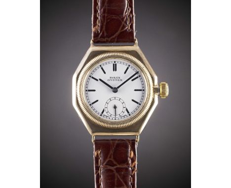 A GENTLEMAN'S 9CT SOLID GOLD ROLEX OYSTER OCTAGONAL WRIST WATCHCIRCA 1932, WITH ENAMEL DIAL & BLUE STEEL HANDS, ACCOMPANIED B
