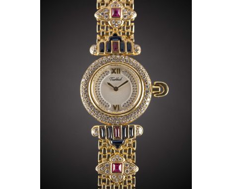 A LADIES 18K SOLID GOLD, DIAMOND, SAPPHIRE & RUBY TABBAH BERET BRACELET WATCHCIRCA 1990s, WITH ORIGINAL DIAMOND SET DIALMovem