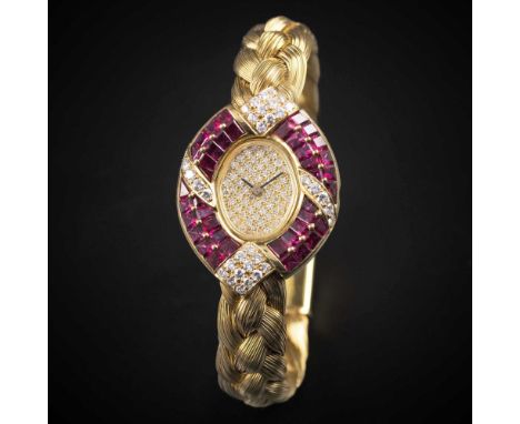 A LADIES 18K SOLID GOLD, DIAMOND & RUBY THE ROYAL DIAMOND BRACELET WATCHCIRCA 1990s, WITH ORIGINAL PAVÉ SET DIAMOND DIALMovem