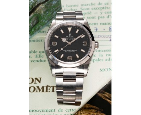 A RARE GENTLEMAN'S STAINLESS STEEL ROLEX OYSTER PERPETUAL EXPLORER "BLACK OUT" BRACELET WATCHDATED 1991, REF. 14270 WITH ORIG