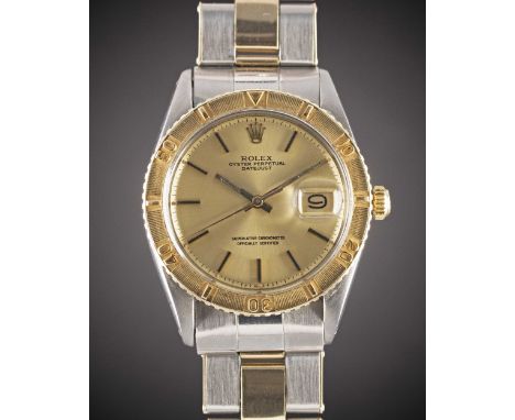 A GENTLEMAN'S STEEL & GOLD ROLEX OYSTER PERPETUAL DATEJUST TURNOGRAPH BRACELET WATCHCIRCA 1976, REF. 1625 WITH CHAMPAGNE SIGM