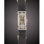 A RARE LADIES PLATINUM & DIAMOND CARTIER COCKTAIL WATCH CIRCA 1920s Movement: 19J, manual wind,