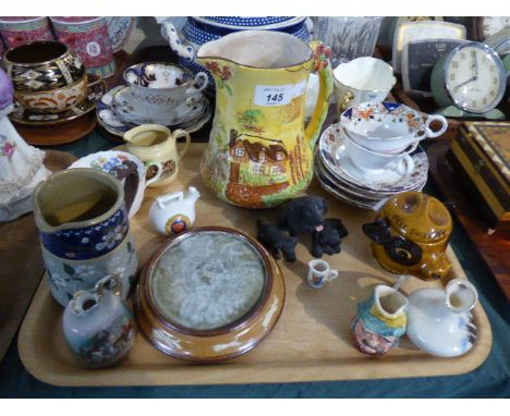 A Tray of Ceramics to include Price Jug, Szeiler Beef Dripping Jar, Royal Doulton Teapot Stand, Stoneware Jug Etc