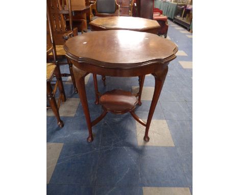 An Edwardian Mahogany Circular Occasional Table with Stretcher Shelf on Extended Cabriole Legs, 74cm Diameter 