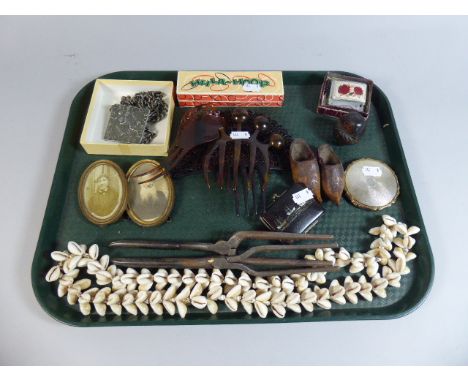 A Tray of Curios to Include Shell Necklace, Powder Compact, Pocket Lighters, Hula Hoop Mouth Organ etc