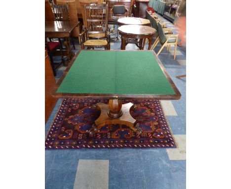 A 19th Century Rosewood Lift and Twist Games Table with Beize Playing Service and Quadrant Base with Four Scrolled Feet, Four