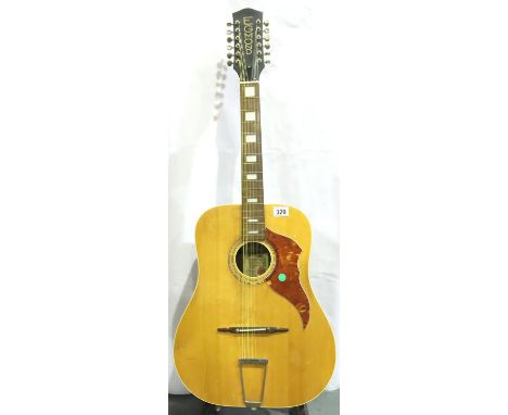 Egmond twelve string acoustic guitar. Not available for in-house P&amp;P, contact Paul O'Hea at Mailboxes on 01925 659133 