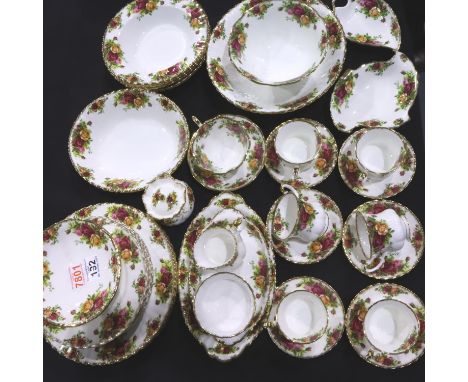 Royal Albert, a collection of ceramics in The Old Country Roses pattern, including a tea service, dinner plates, bowls etc, a