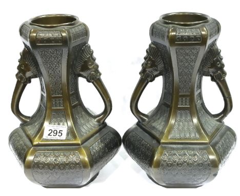 Pair of bronzed ceramic Japanese Temple vases, design and relief, one with repaired damage, H: 28 cm. P&amp;P Group 3 (£25+VA