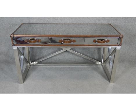 An Andrew Martin style mirrored and leather travel trunk style bound console table on brushed chromium base. H.81 W.150 D.60c