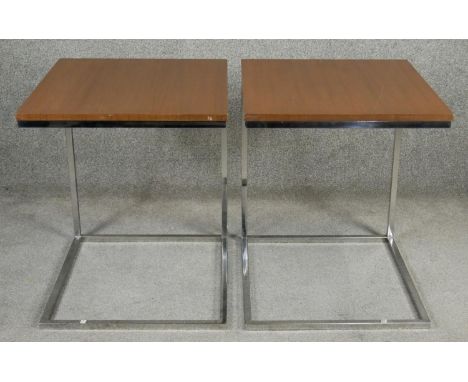 A pair of vintage lamp or bedside tables with composite laminated tops on chromium bases. H.60 W.50 D.55cm