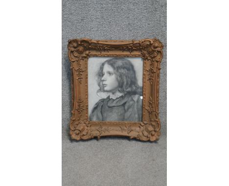 A 20th Century gilt framed and glazed print of a charcoal study, profile of a young lady. H.50 W.42cm 