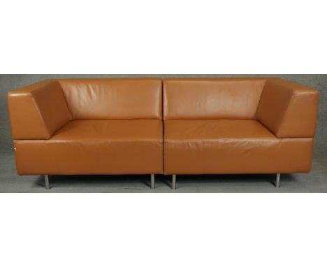 A contemporary Hay 'Mags' two section modular sofa upholstered in light tan leather. H.78 L.220 D.87cm 