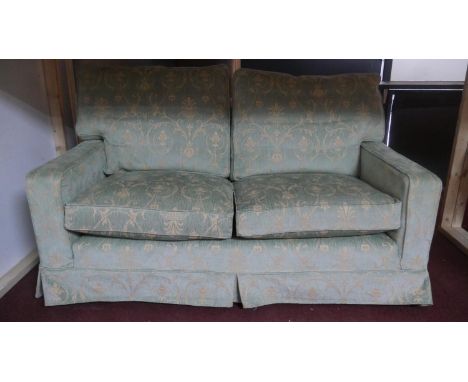 A floral upholstered two seater sofa. W.163 H.96 D.95 