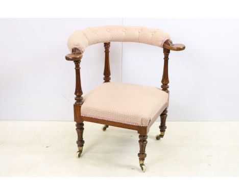 Edwardian hard wood upholstered corner chair on turned legs with castors and button back detail, approx. H 73cm