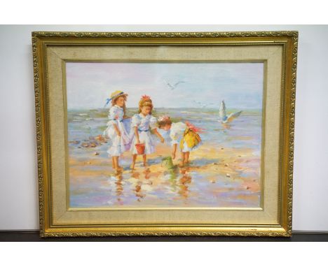 Impressionist beach scene with girls paddling, oil on canvas, 31 x 40cm, gilt framed