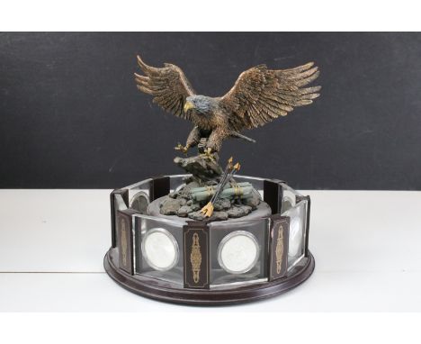 Danbury Mint 'Morgan Silver Dollars Crystal Collection' comprising revolving display stand with eagle surmount inset with eig