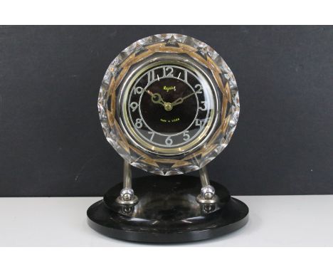 Majak, USSR, vintage mid 20th century Russian mantle desk clock of circular form with faceted edges, the face with alphanumer