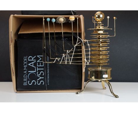 Build a model solar system, precision engineered orrery, with folder files, magazines, tools and final model