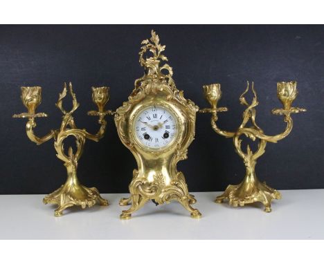 French gilt metal Bornand Rococo mantel clock, H 30cm, with pair of matching two branched candle holders