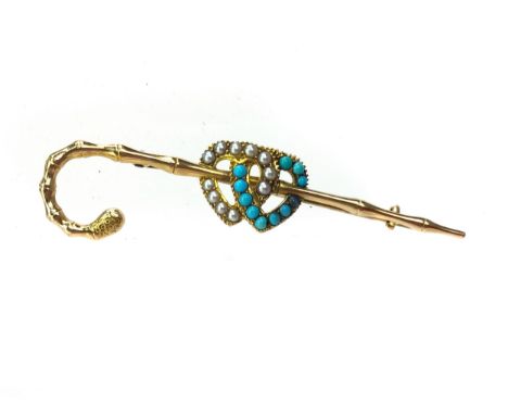 TURQUOISE AND SEED PEARL BAR BROOCH, formed by two interlocking hearts, one set with turquoise, the other seed pearls, upon a