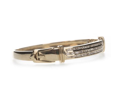 DIAMOND BANGLE, set with three rows of round brilliant cut diamonds totalling approximately 1.50 carats, unmarked, 17.3g