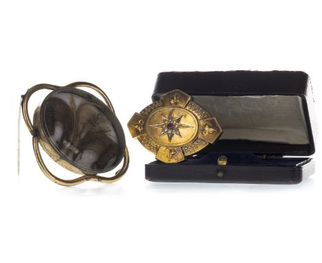 TWO VICTORIAN MOURNING BROOCHES, including a red gem set and pearl example, and an ornate hairwork example, each unmarked (2)