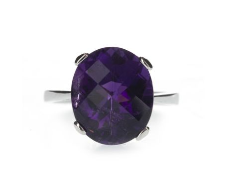 AMETHYST RING, set with a faceted amethyst of approximately 9.25 carats, in nine carat white gold, size N 1/2, 4.1g