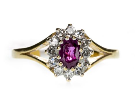 RUBY AND DIAMOND CLUSTER RING, set with an oval ruby within a halo of round brilliant cut diamonds totalling approximately 0.