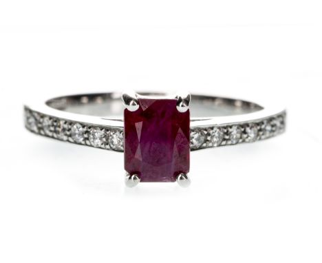 RUBY AND DIAMOND RING, set with a step cut ruby flanked by round brilliant cut diamonds totalling approximately 0.20 carats, 