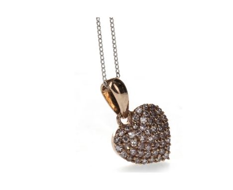 PINK DIAMOND SET HEART PENDANT, set with light pink diamonds totalling approximately 0.40 carats, unmarked rose coloured meta