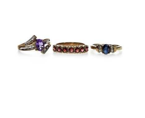 RED GEM SET RING, with seven round red gems, in nine carat gold, size N, along with a blue gem set and diamond ring, in nine 