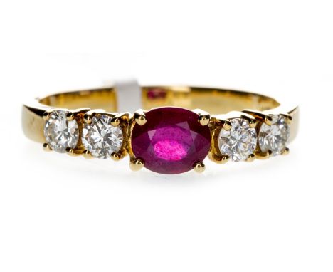 TREATED RUBY AND DIAMOND FIVE STONE RING, set with an oval treated ruby flanked by round brilliant cut diamonds totalling app