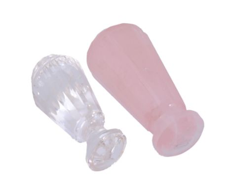  A 19th century solid rose quartz desk seal,   with a facetted pommel, tapered to the circular matric carved with a swallow a