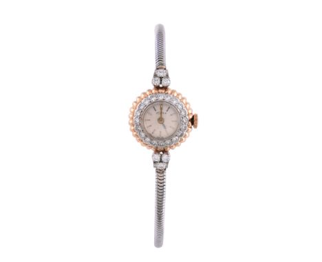  Vertex, ref. 246/2211, a lady's two colour and diamond bracelet watch,   manual wind movement, 17 jewels, cal. 7311, silvere